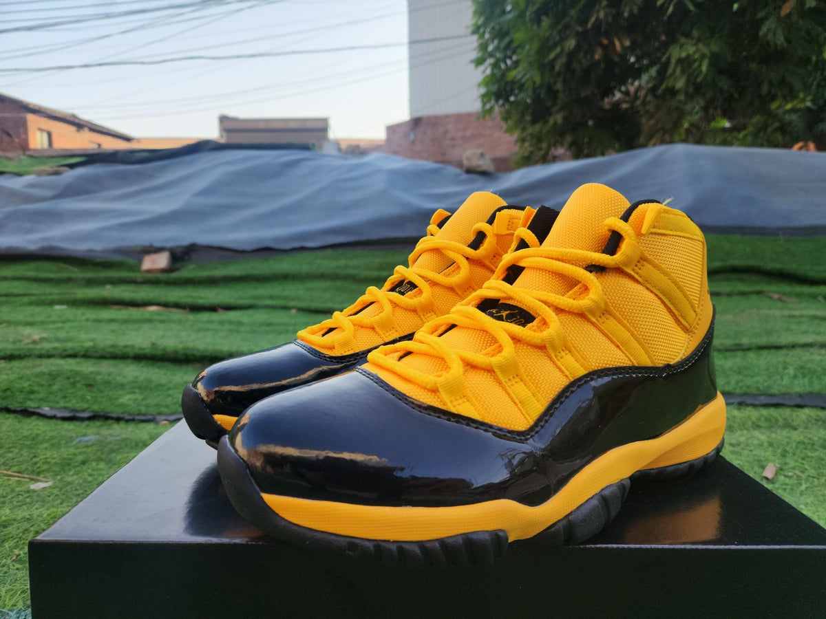 Air Jordan 11 Orange, Yellow & Black
